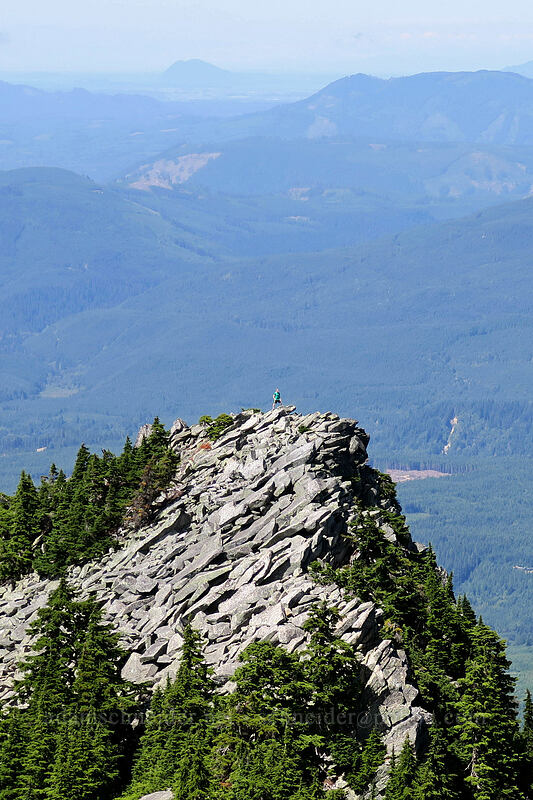 hiker on a crag [Mount Pilchuck Trail, Mount Pilchuck State Park, Snohomish County, Washington]