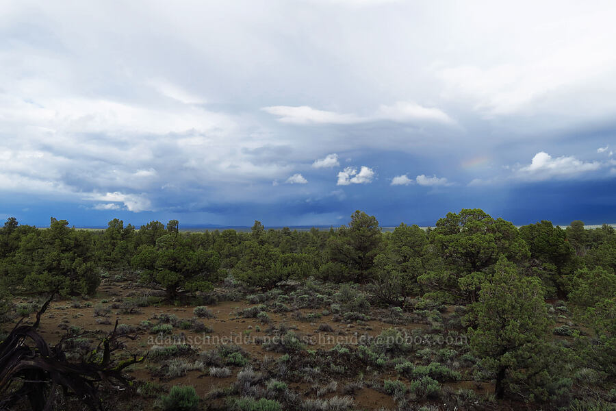 rain clouds & a tiny rainbow [Flatiron Rock Trail, Oregon Badlands Wilderness, Deschutes County, Oregon]