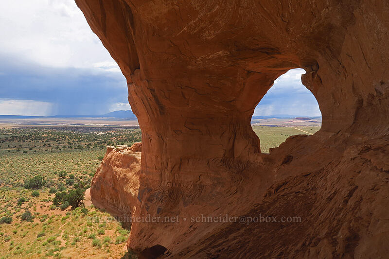 sandstone arches & distant storms [Looking Glass Rock, San Juan County, Utah]