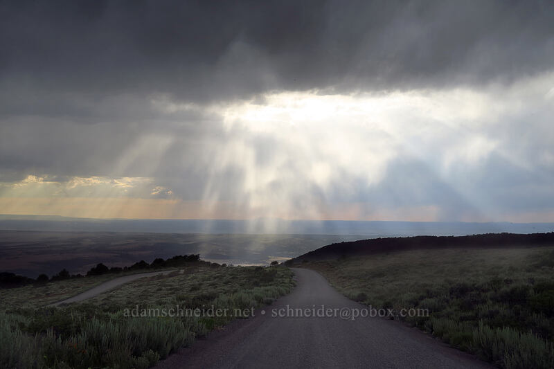 evening sunlight throough clouds [South Loop Road, Steens Mountain, Harney County, Oregon]