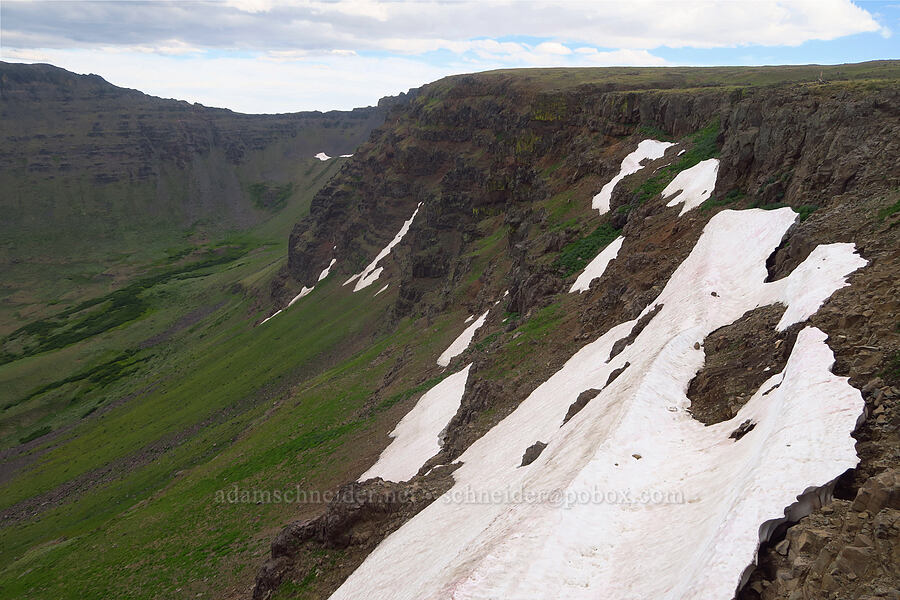 snowfields on the west rim of Kiger Gorge [west rim of Kiger Gorge, Steens Mountain, Harney County, Oregon]