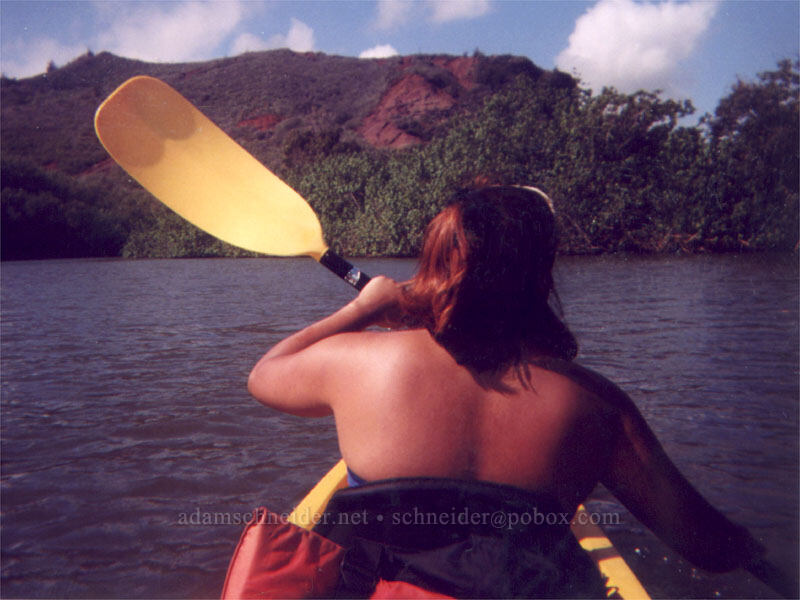 Ana Liza paddling up the Wailua River [Wailua River State Park, Wailua, Kaua'i, Hawaii]