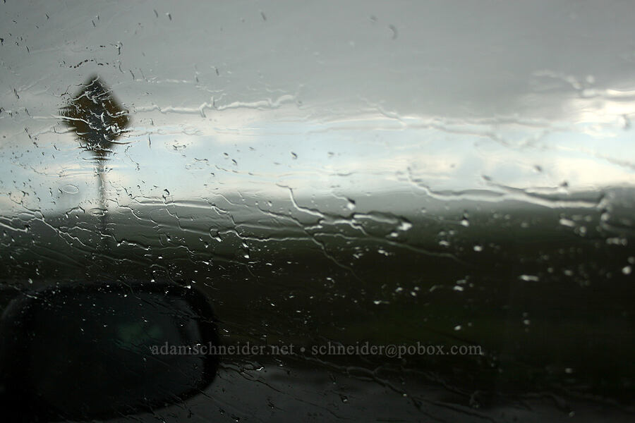 rainy window & road sign [Highway 97, Klickitat County, Washington]