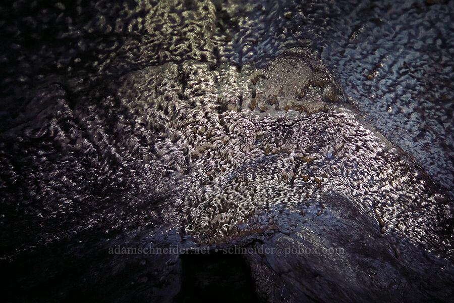 shiny patterns on the ceiling [Ape Cave, Mt. St. Helens National Volcanic Monument, Skamania County, Washington]